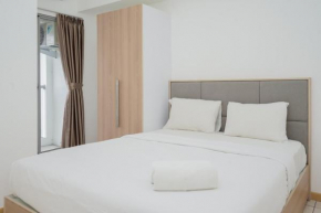 Cozy Living 2BR at M-Town Residence Apartment By Travelio